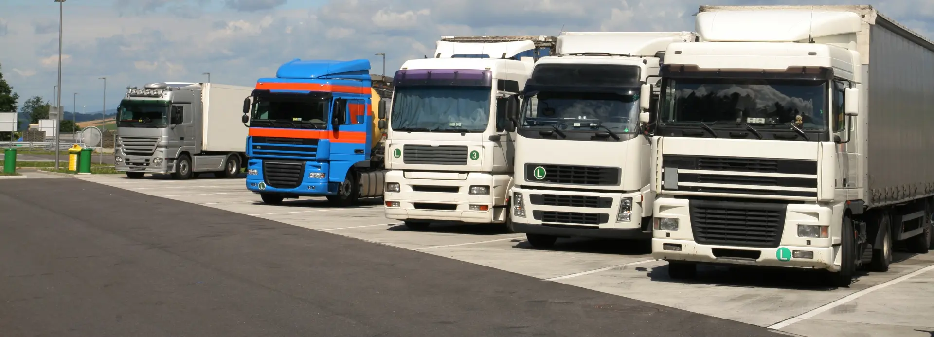 Fleet of trucks parked in the logistics park